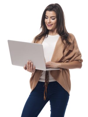 Beautiful woman staying connected with internet